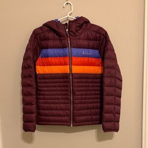 Cotopaxi Burgundy Puffer Jacket with Blue and Orange Stripes